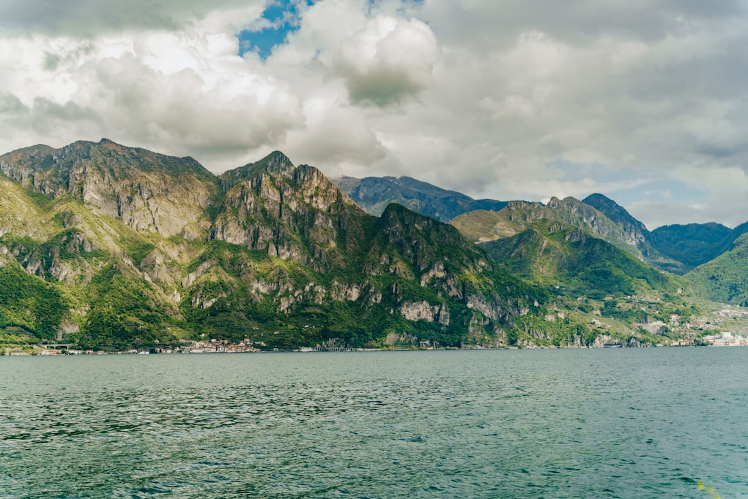 Italian lake district with calm waters and mountain backdrop