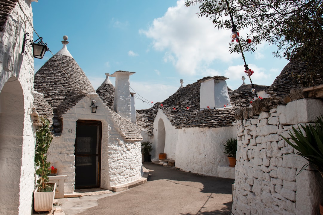 Puglia landscape with trulli buildings and olive groves