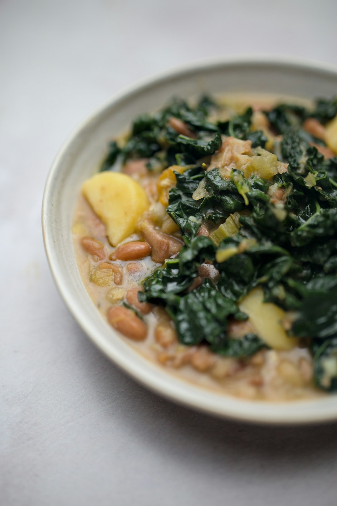 Ribollita Tuscan bread soup with cannellini beans and cavolo nero kale