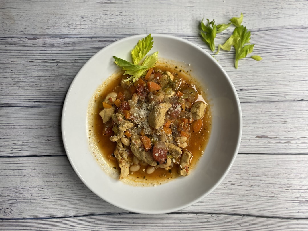 Tuscan bread soup ribollita with cavolo nero and stale bread served in terracotta