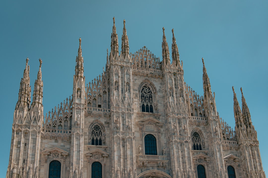 a large cathedral with a clock on the front of it
