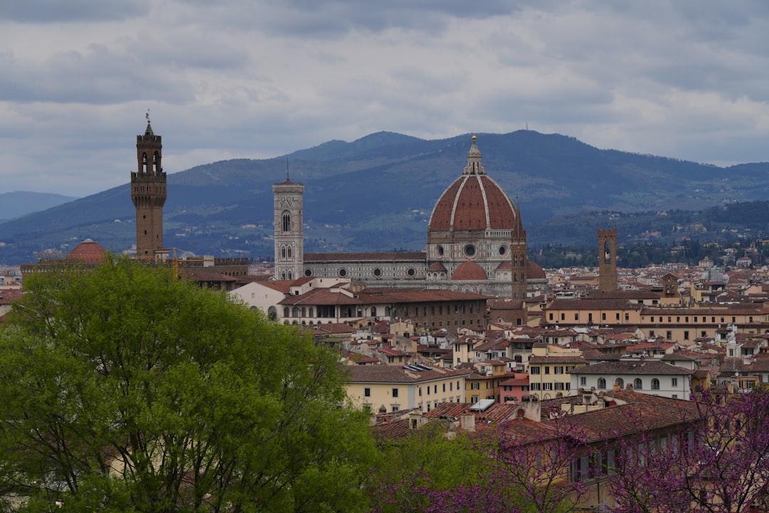 Florence cityscape with duomo and mountains in the background mountains