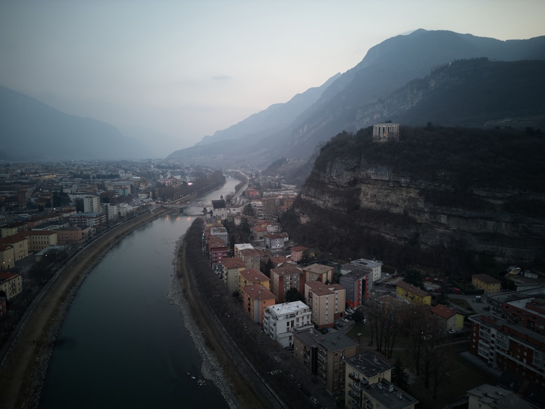 Aerial view of the Adige river running through Trento in the Trentino Alps in winter